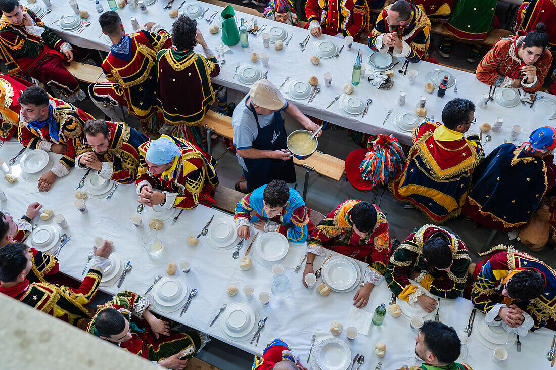 Traditional lunch at The Festival of Saint John of Sobrado, also known as Bugiada and Mouriscada de Sobrado, takes place in the form of a fight between Moors and Christians , locally known as Mourisqueiros and Bugios, Sao Joao de Sobrado, Portugal