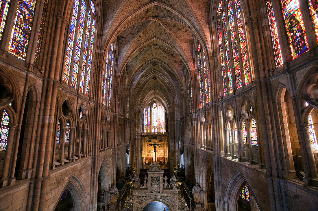 Leon, Spain, Aug 21 2008, Explore the magnificent interior of León Cathedral showcasing breathtaking stained glass windows that illuminate the nave beautifully.