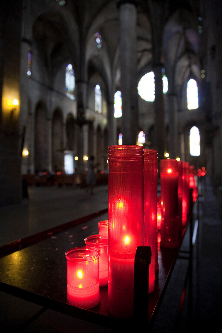 Barcelona, Spain, Sept 4 2008, Votive candles glow softly in the serene atmosphere of Santa María del Mar, enhancing the tranquil setting in Barcelonas historic church.