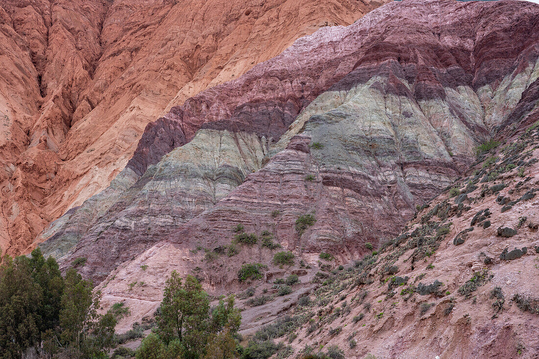 Striated rock layers in the Hill of Seven Colors or Cerro de los Siete Colores in Purmamarca, Argentina.