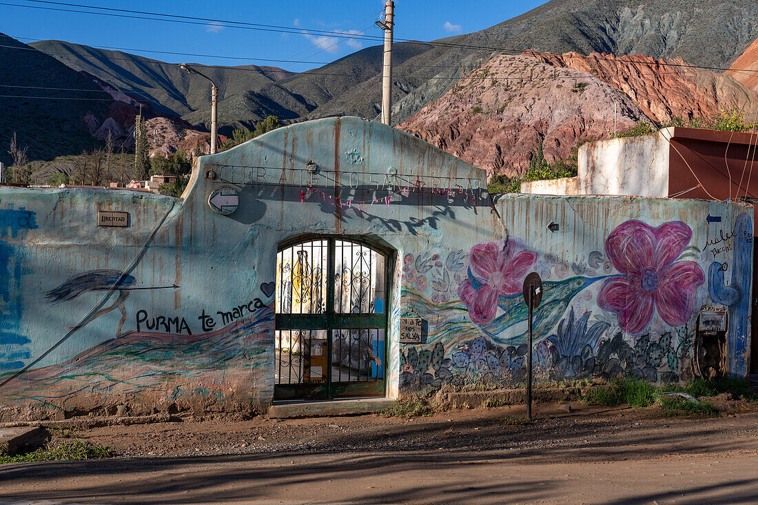 Wall art mural around the gate of the Santa Rosa Athletic Club in Purmamarca, Argentina.