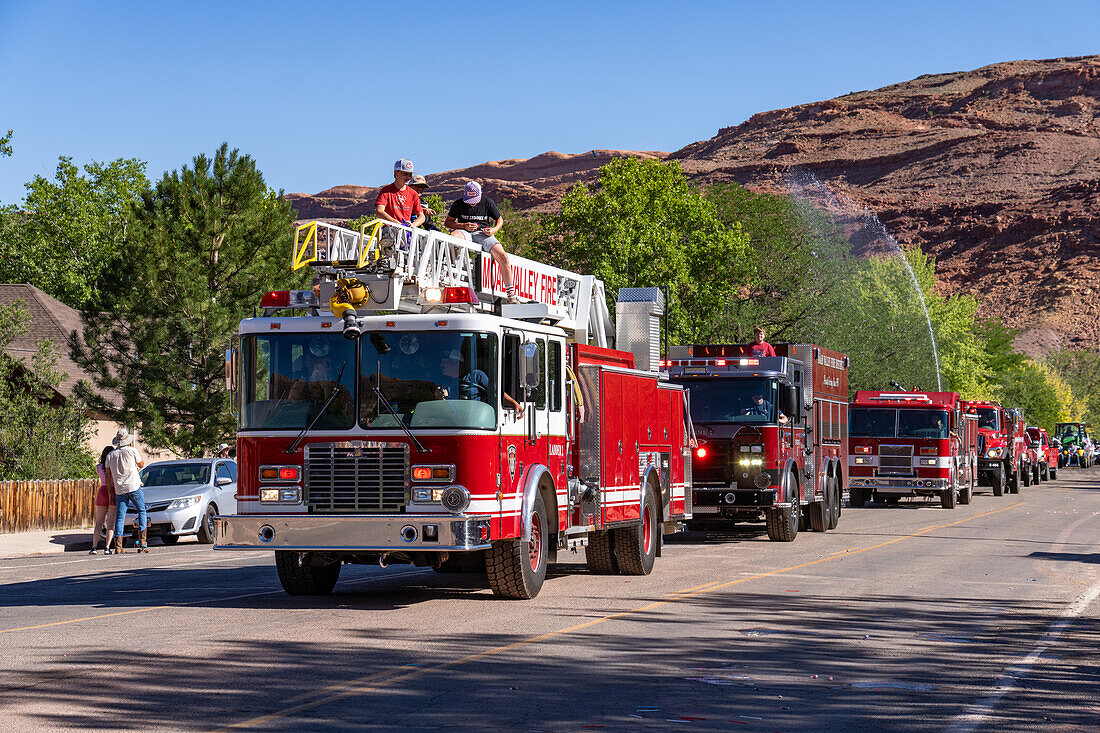 A fire department ladder truck in the Fourth of July Parade on Independence Day in Moab, Utah.