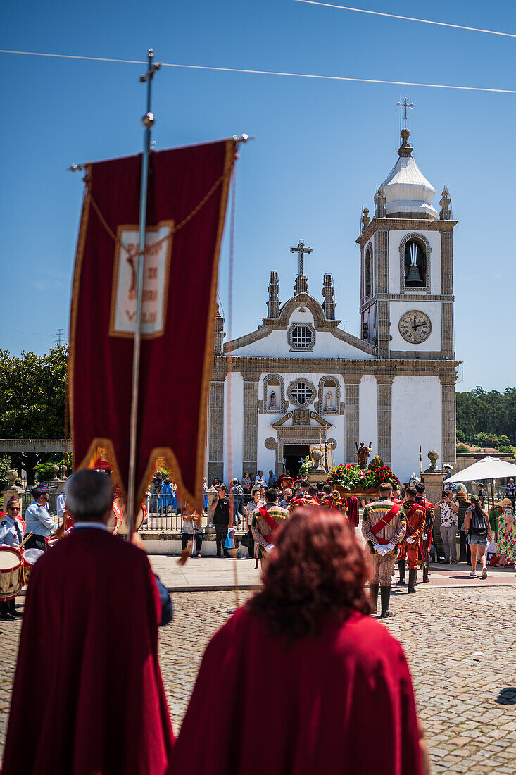 Religious procession enters São João Baptista Church during the Festival of Saint John of Sobrado, also known as Bugiada and Mouriscada de Sobrado, takes place in the form of a fight between Moors and Christians , locally known as Mourisqueiros and Bugios, Sao Joao de Sobrado, Portugal