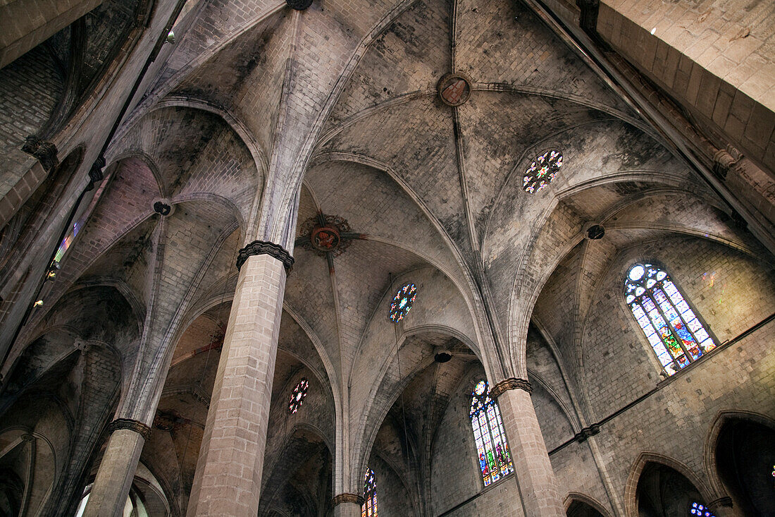 Barcelona, Spain, Sept 4 2008, Explore the stunning Gothic architecture of Santa María del Mar, showcasing intricate vaults and colorful stained glass windows.