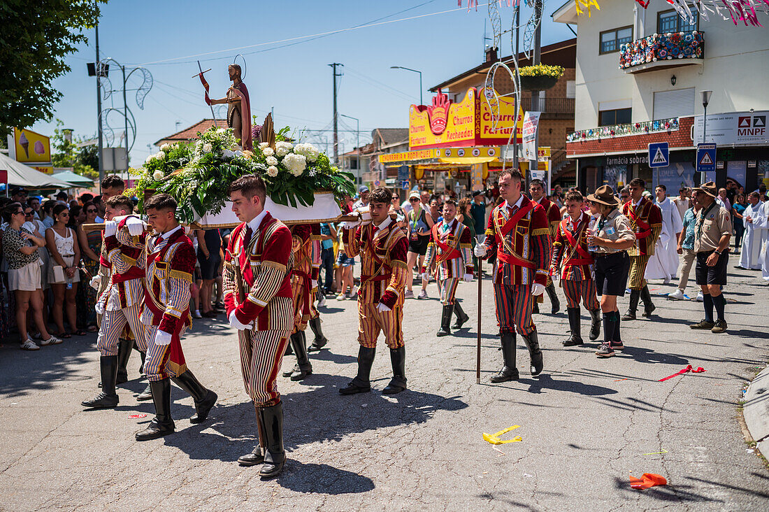 Religious procession finishing at São João Baptista Church during the Festival of Saint John of Sobrado, also known as Bugiada and Mouriscada de Sobrado, takes place in the form of a fight between Moors and Christians , locally known as Mourisqueiros and Bugios, Sao Joao de Sobrado, Portugal