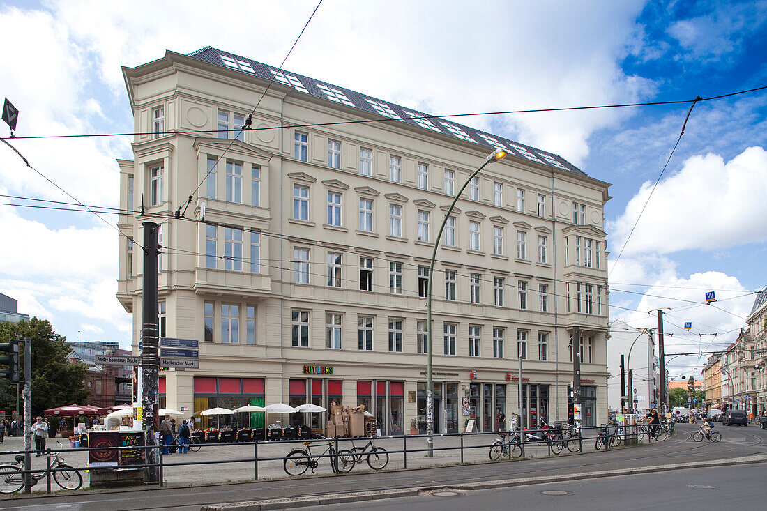 Visitors enjoy the vibrant atmosphere around Hackescher Markt Square, surrounded by charming buildings and lively streets in Berlin.