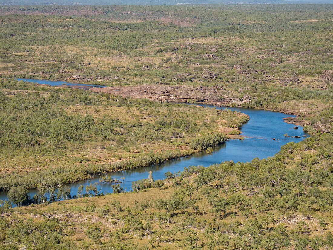 A view of the Mitchell River meandering towards Swift Bay as seen from a commercial helicopter, Kimberley, Western Australia, Australia, Pacific