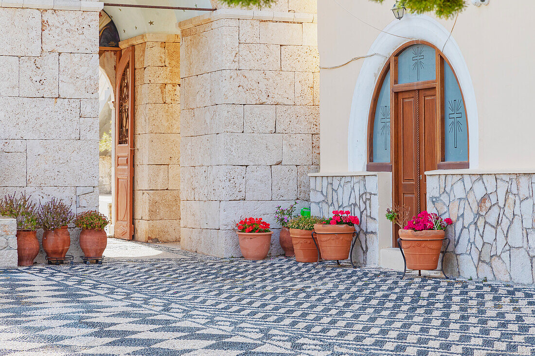 Pavement mosaics outside Saint Nicholas church, Halki Island, Dodecanese Islands, Greek Islands, Greece, Europe