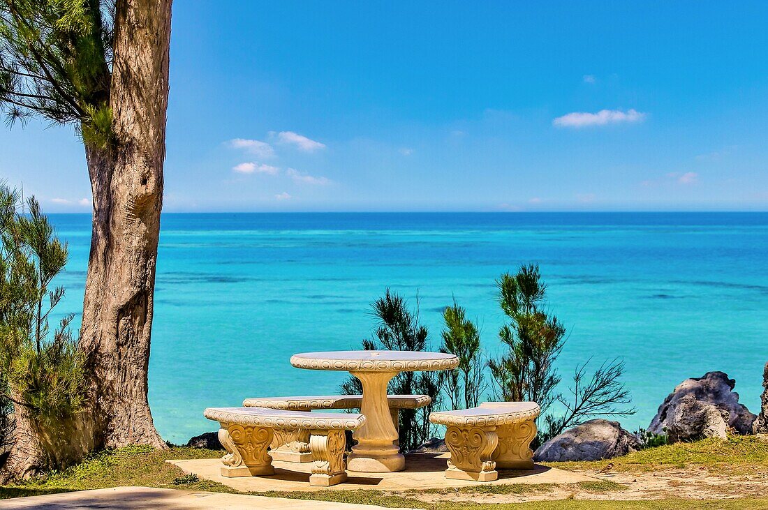 Picnic table next to the ocean, Somerset Parish, Bermuda, Atlantic, North America