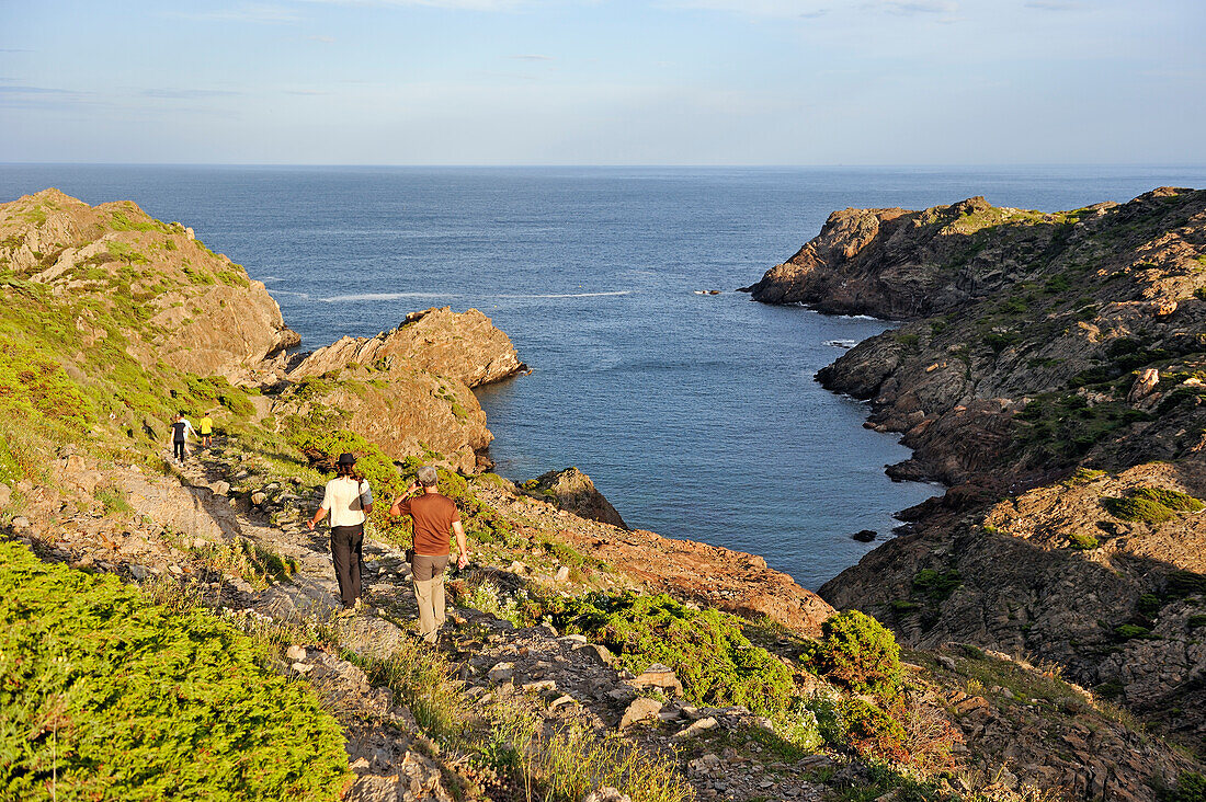 Hikers at Cala Fredosa creek, Cap Creus, Costa Brava, Catalonia, Spain, Europe