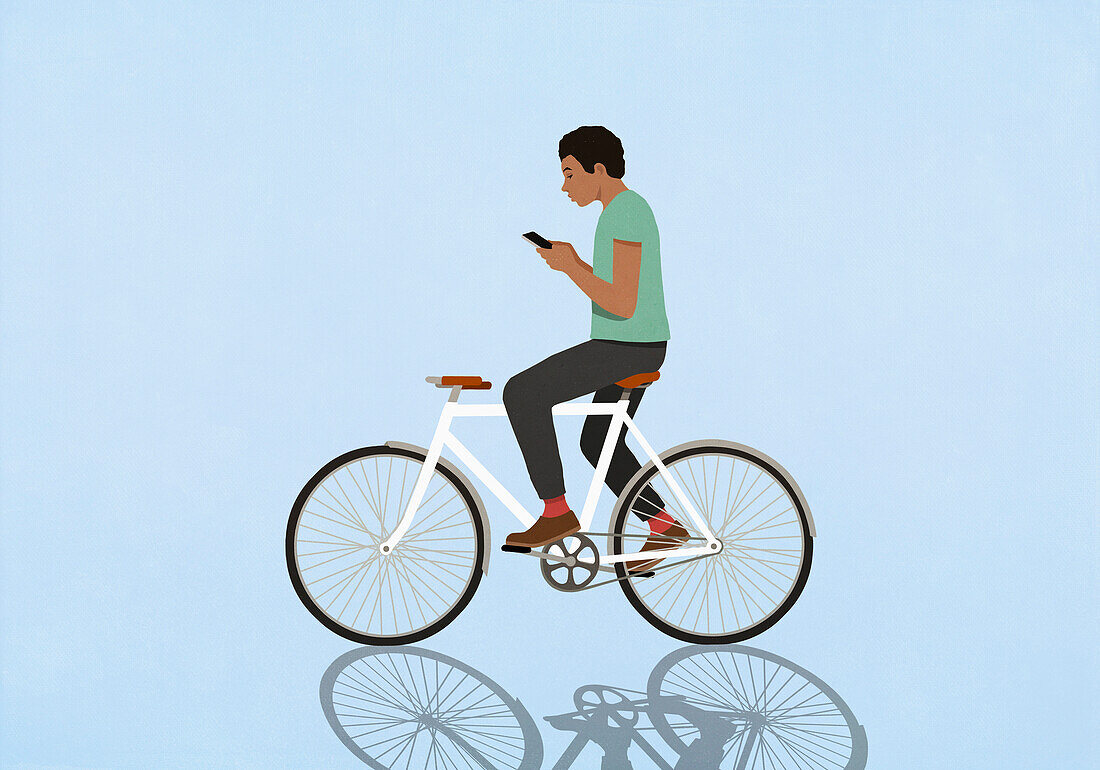 Man with smart phone texting and riding bicycle on blue background