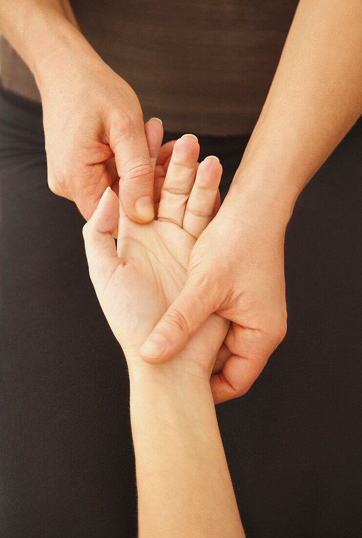 Woman Receiving Reflexology Treatment, Close-up View