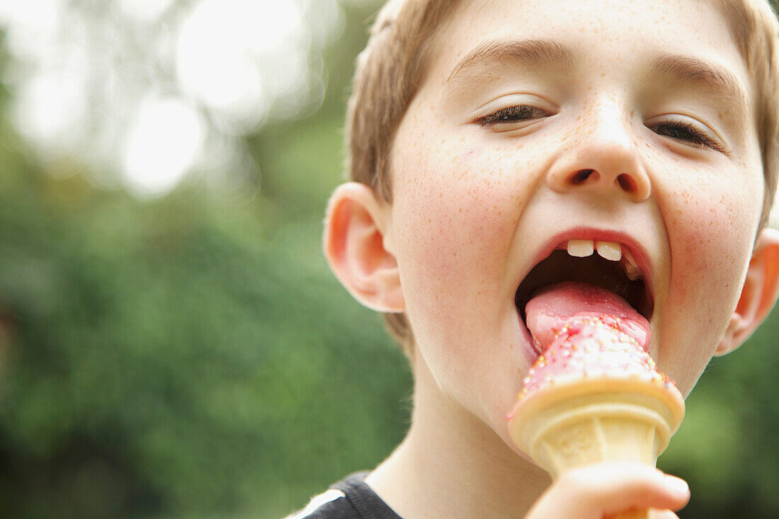 Young Boy Eating Ice Cream