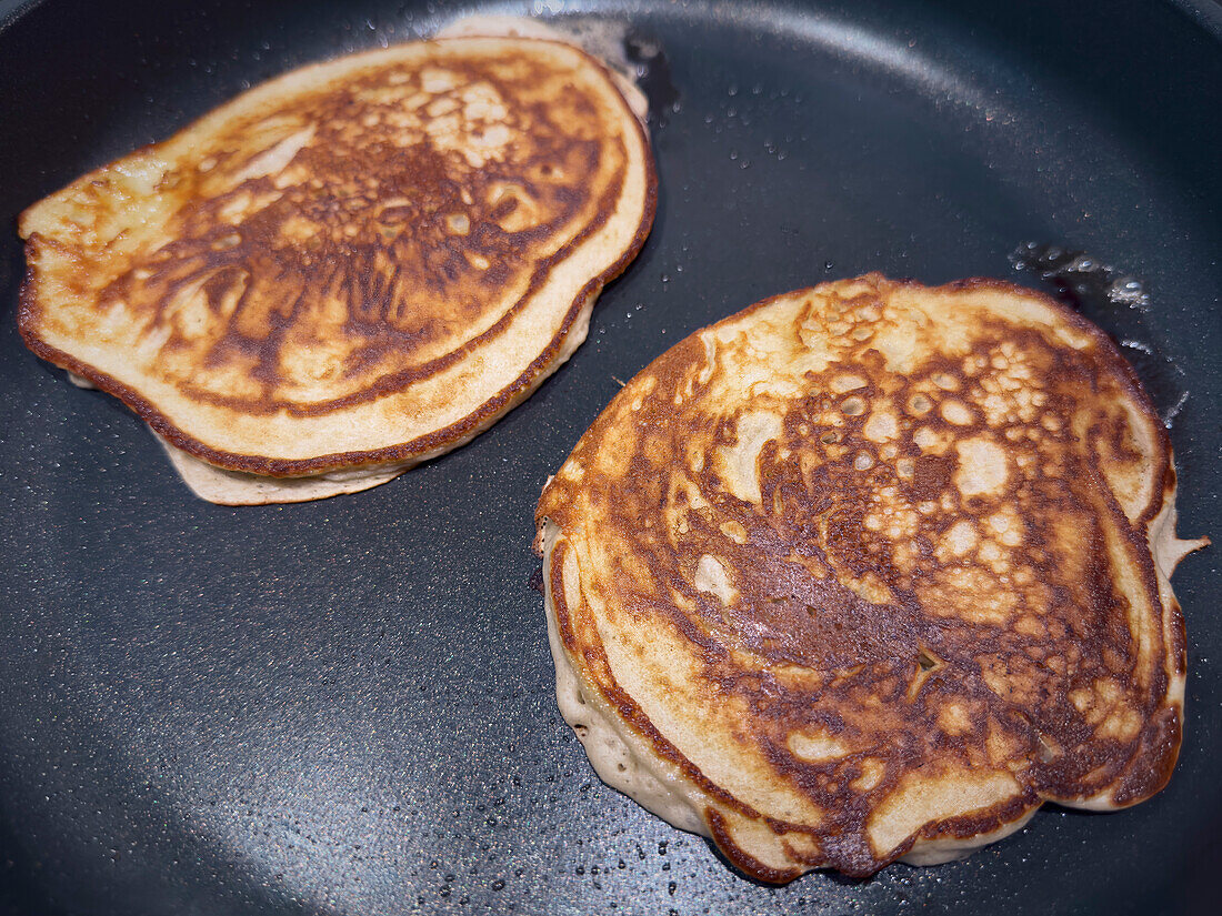 Close up pancakes cooking in hot pan