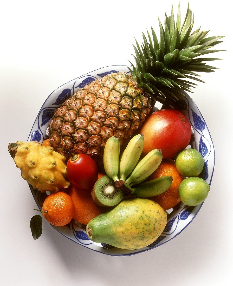 Various exotic fruits on a plate