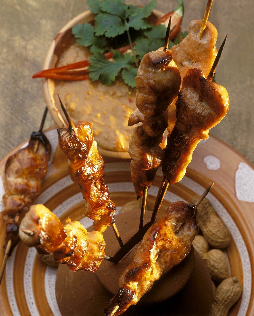 Satay with spicy peanut sauce and chili