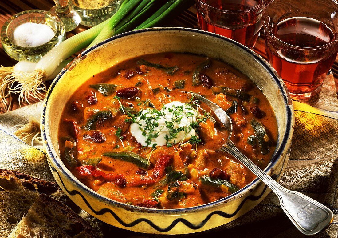 Mexican bean soup with peppers and spring onions