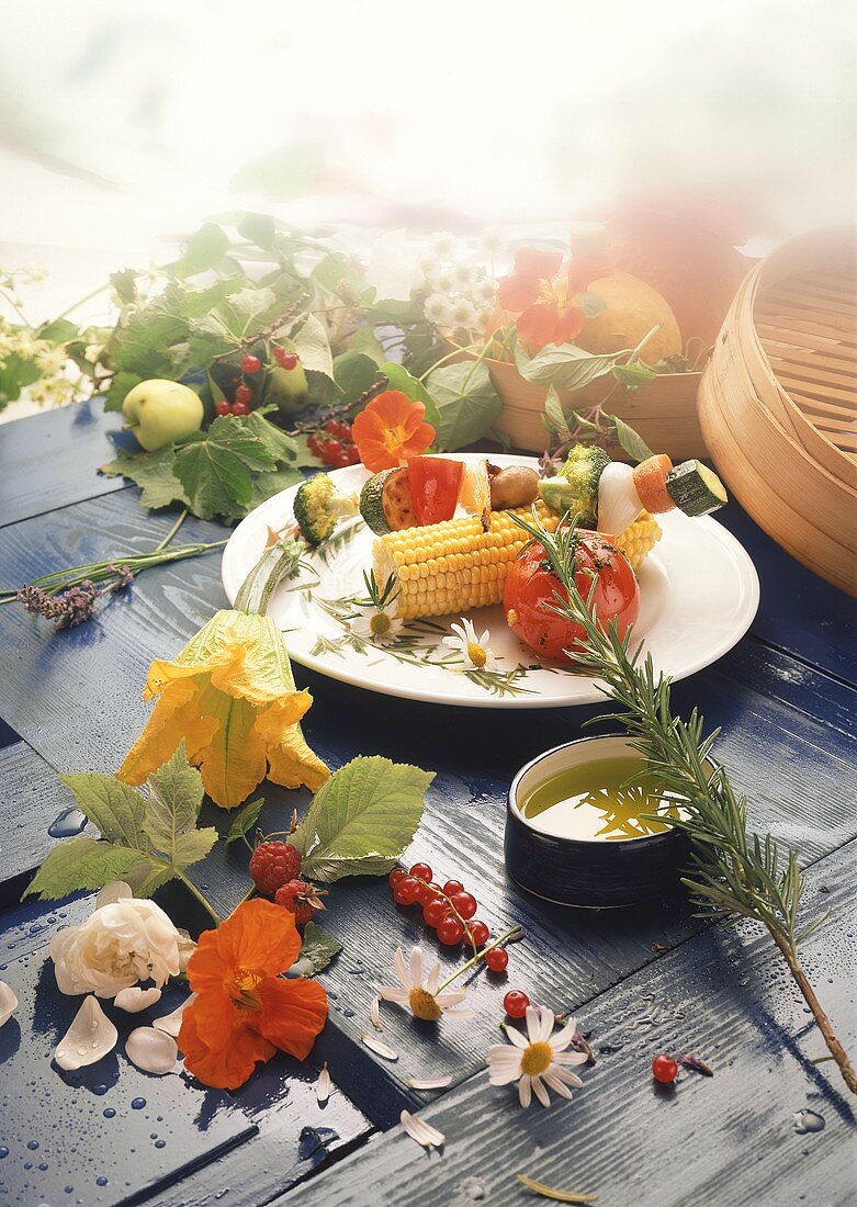 Grilled vegetables & vegetable kebab, décor: summer flowers