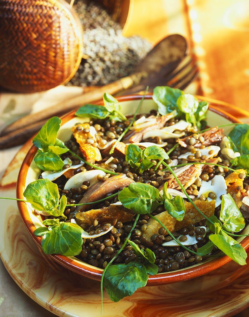 Lentil salad with duck confit, mushrooms and watercress