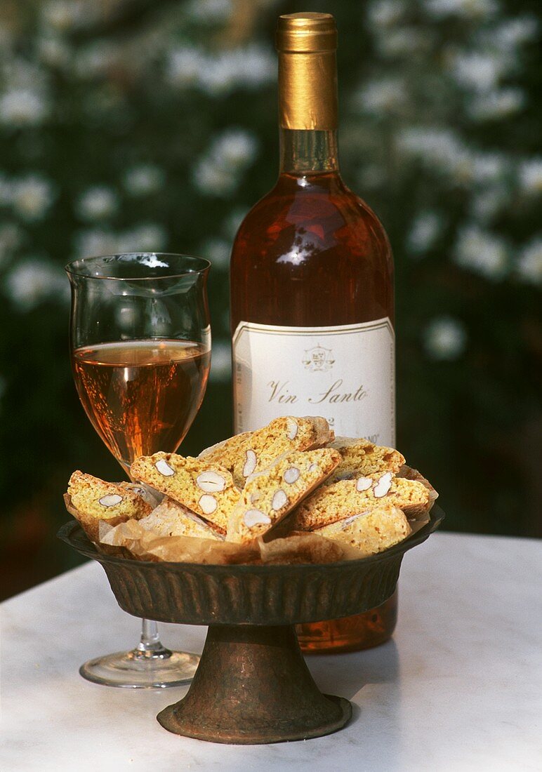A Dish of Italian Almond Cookies with Dessert Wine