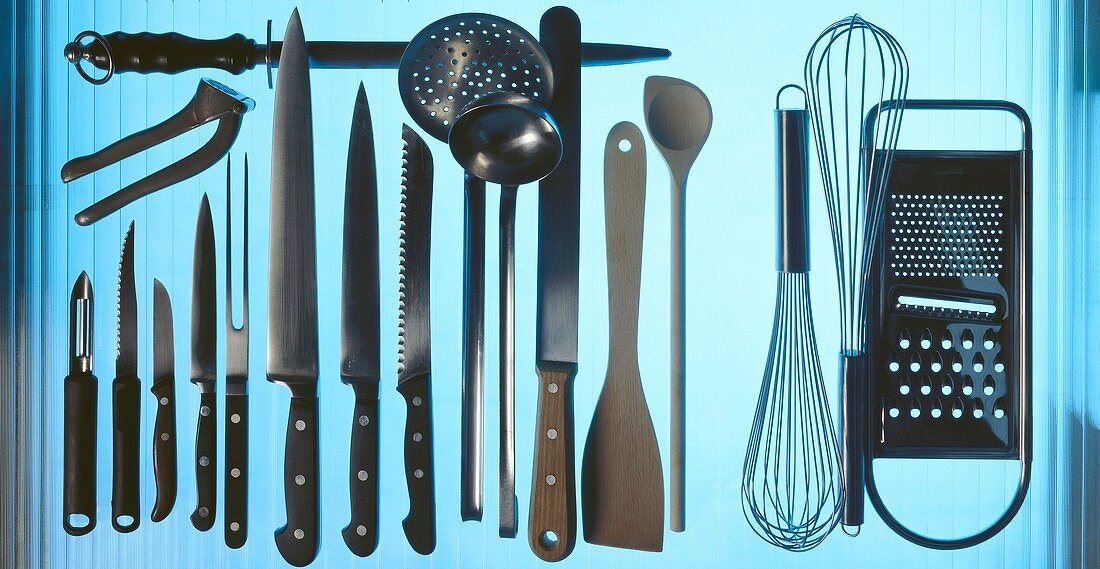 Various kitchen utensils (knife, mixing spoon, grater etc)