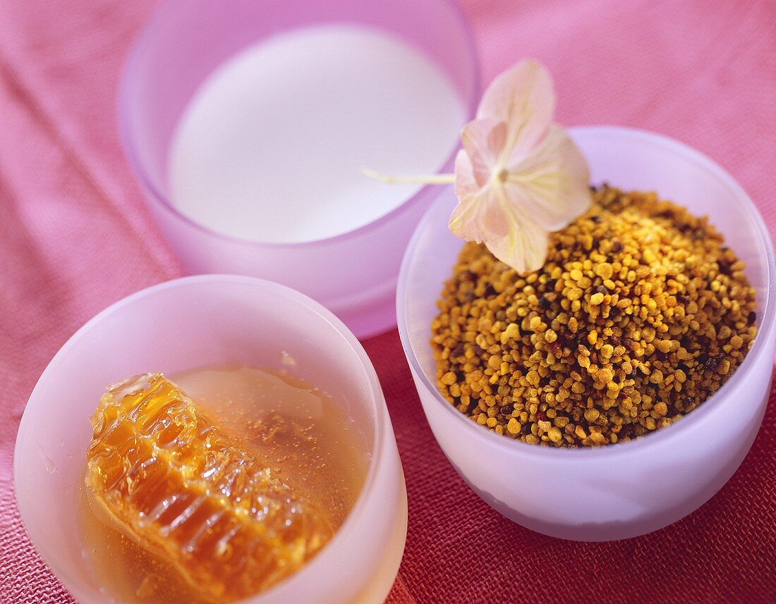 Honey, milk and pollen in bowl