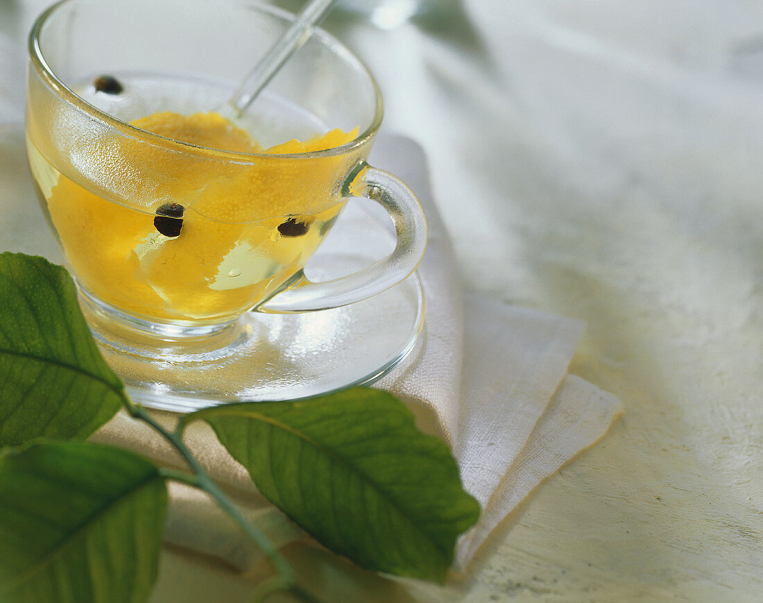 Boiled water with lemon peel and juniper berries