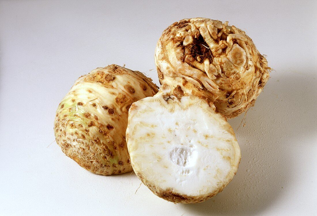 Celeriac, one whole and one halved bulb