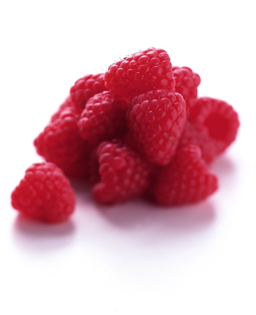 Raspberries on white background