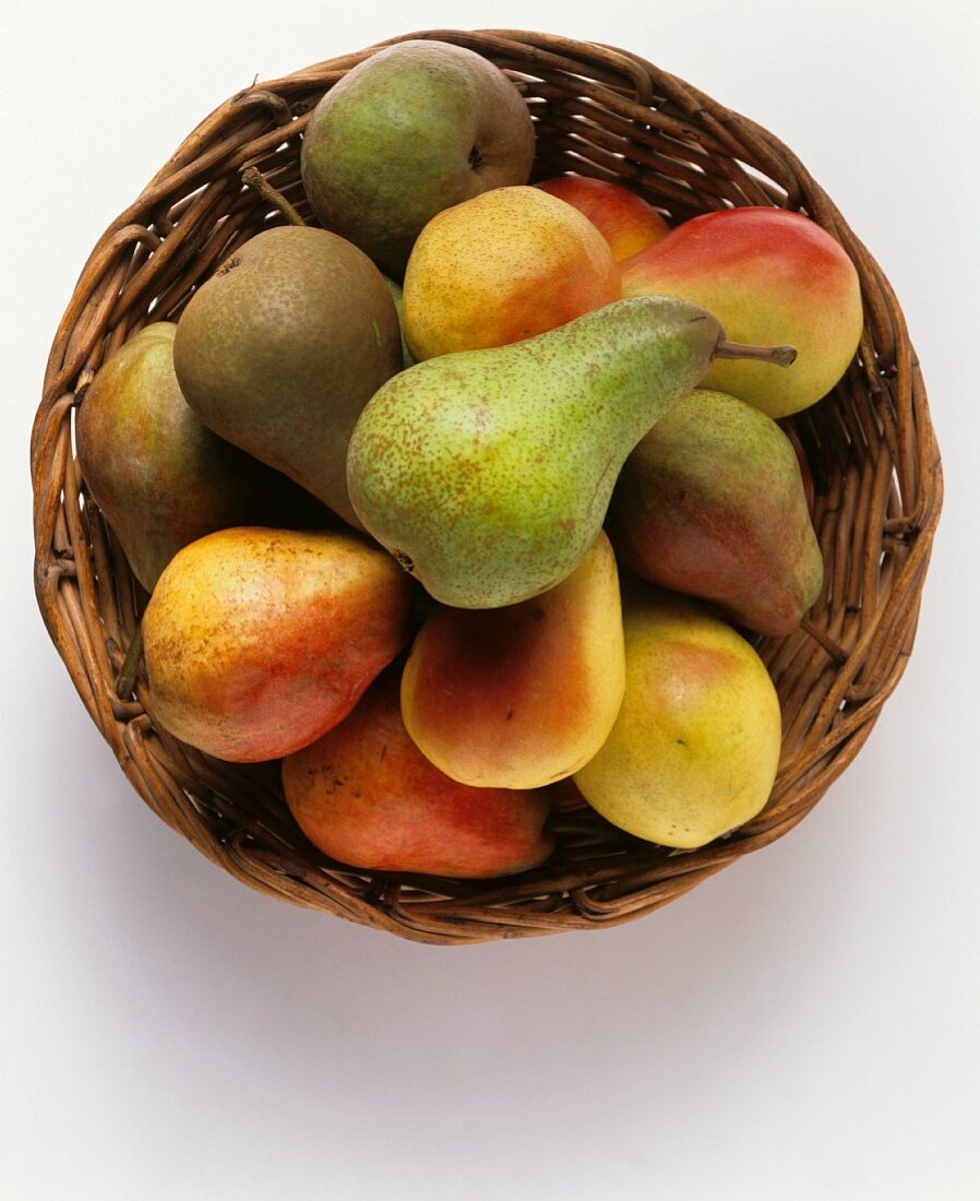 Various pears in a basket