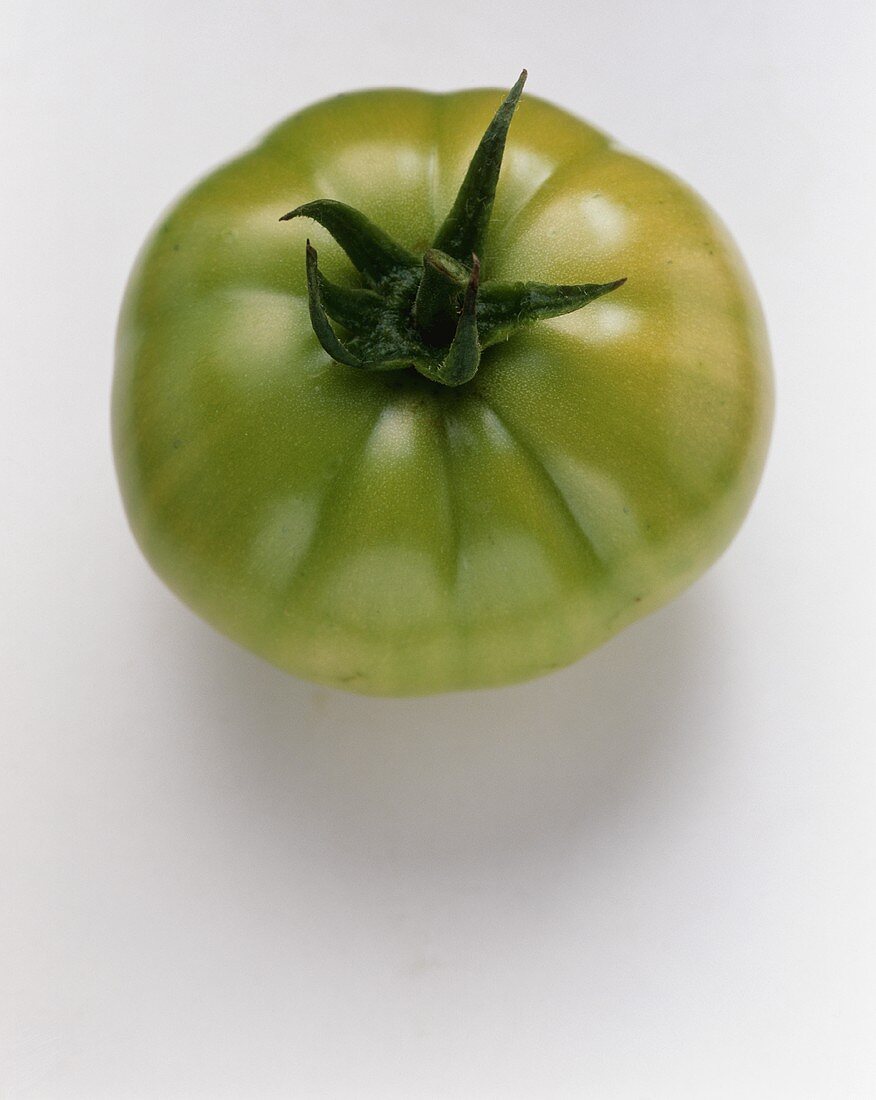 Eine grüne Tomate (von oben)