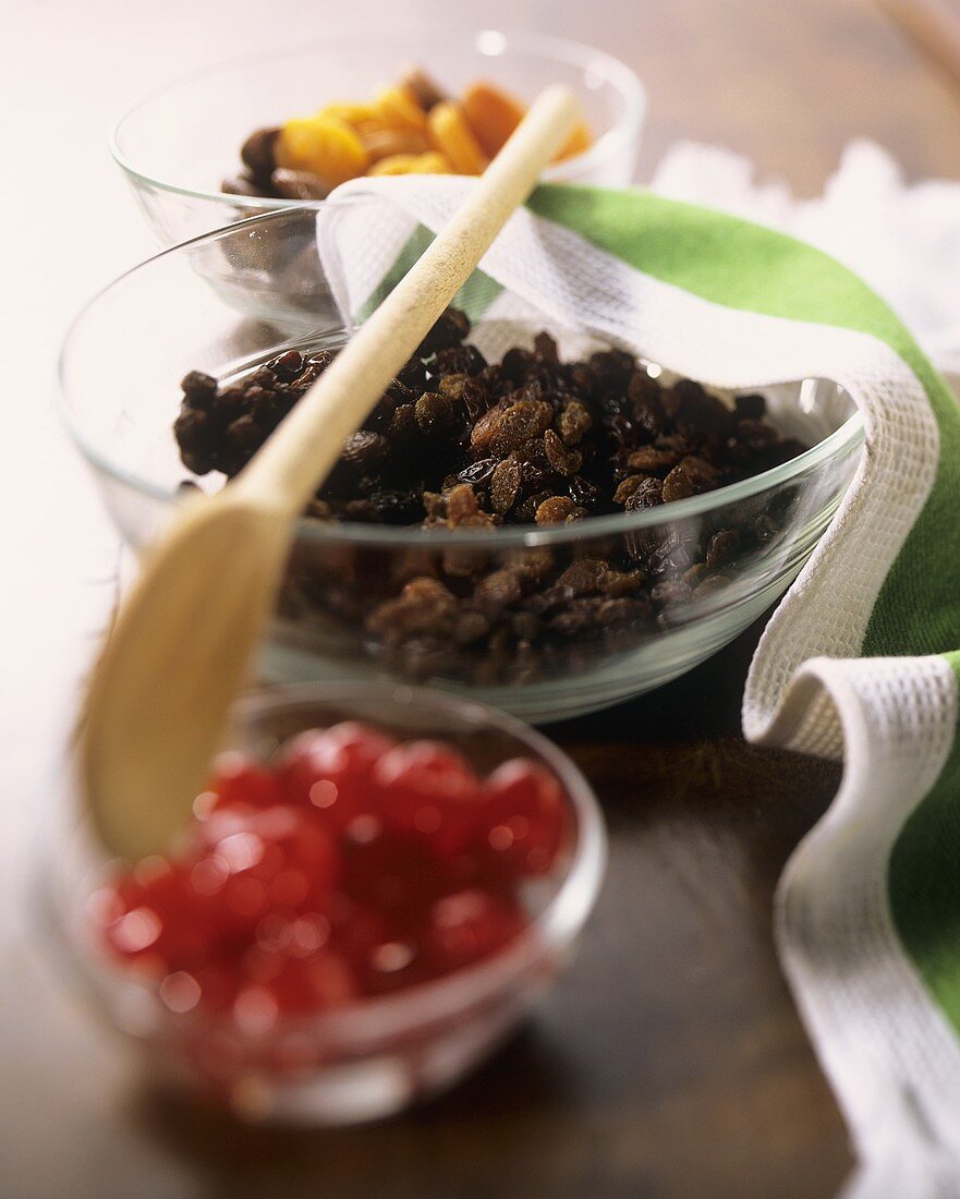 Baking ingredients: berries, raisins, dried fruit in bowls