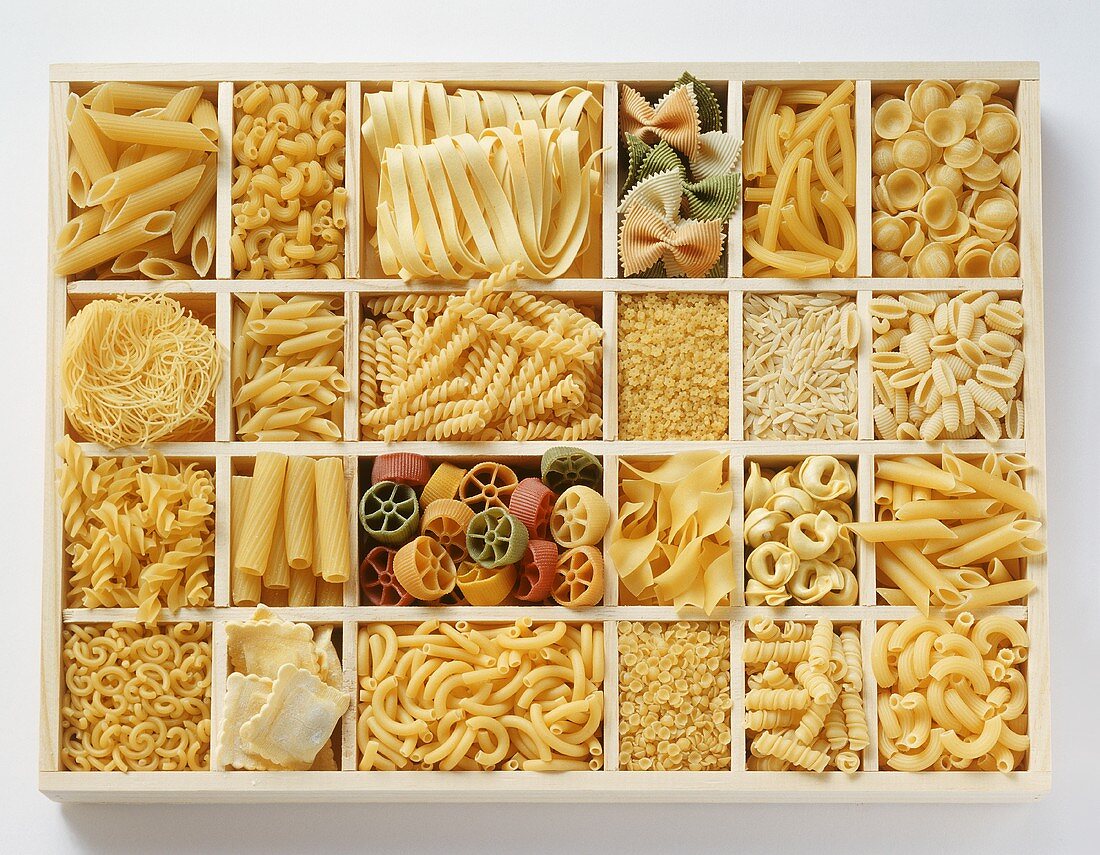 Various pastas in white typesetter's case