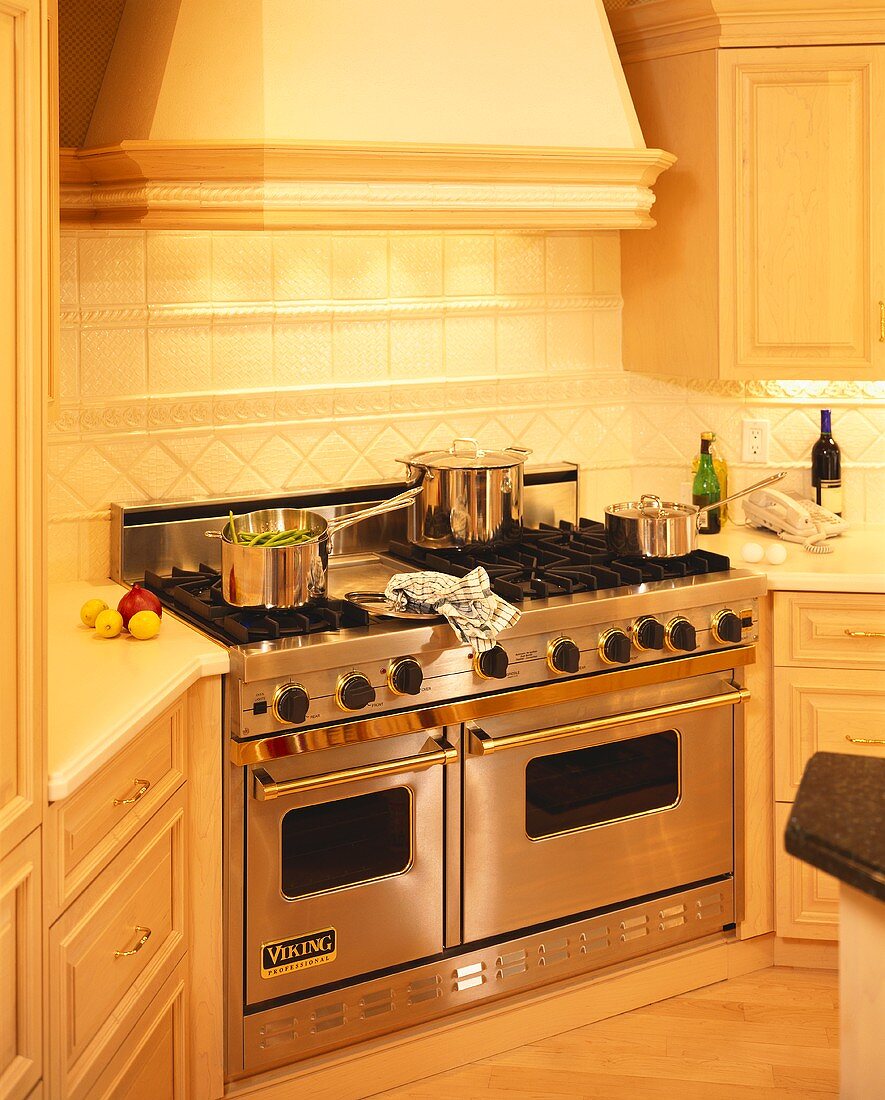 Viking cooker with pans in a light kitchen