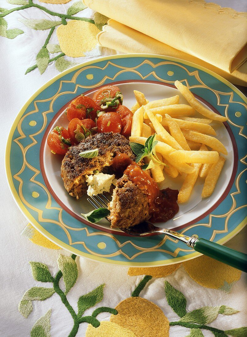 Frikadella with sheep's cheese stuffing and chips