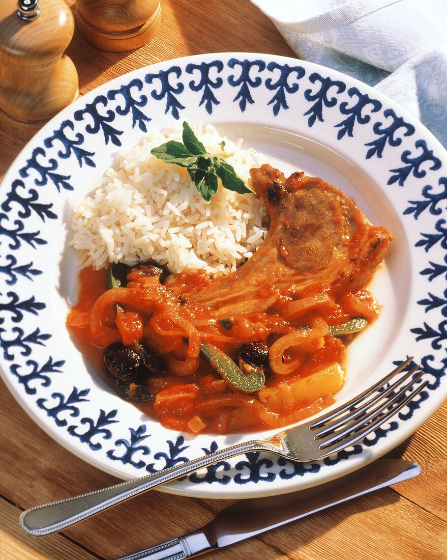 Mediterranean lamb chop with pepper sauce and rice