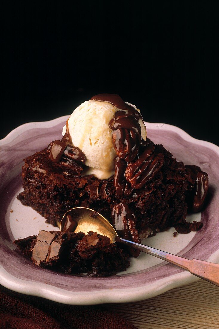 Chocolate cake with pecan icing & vanilla ice cream