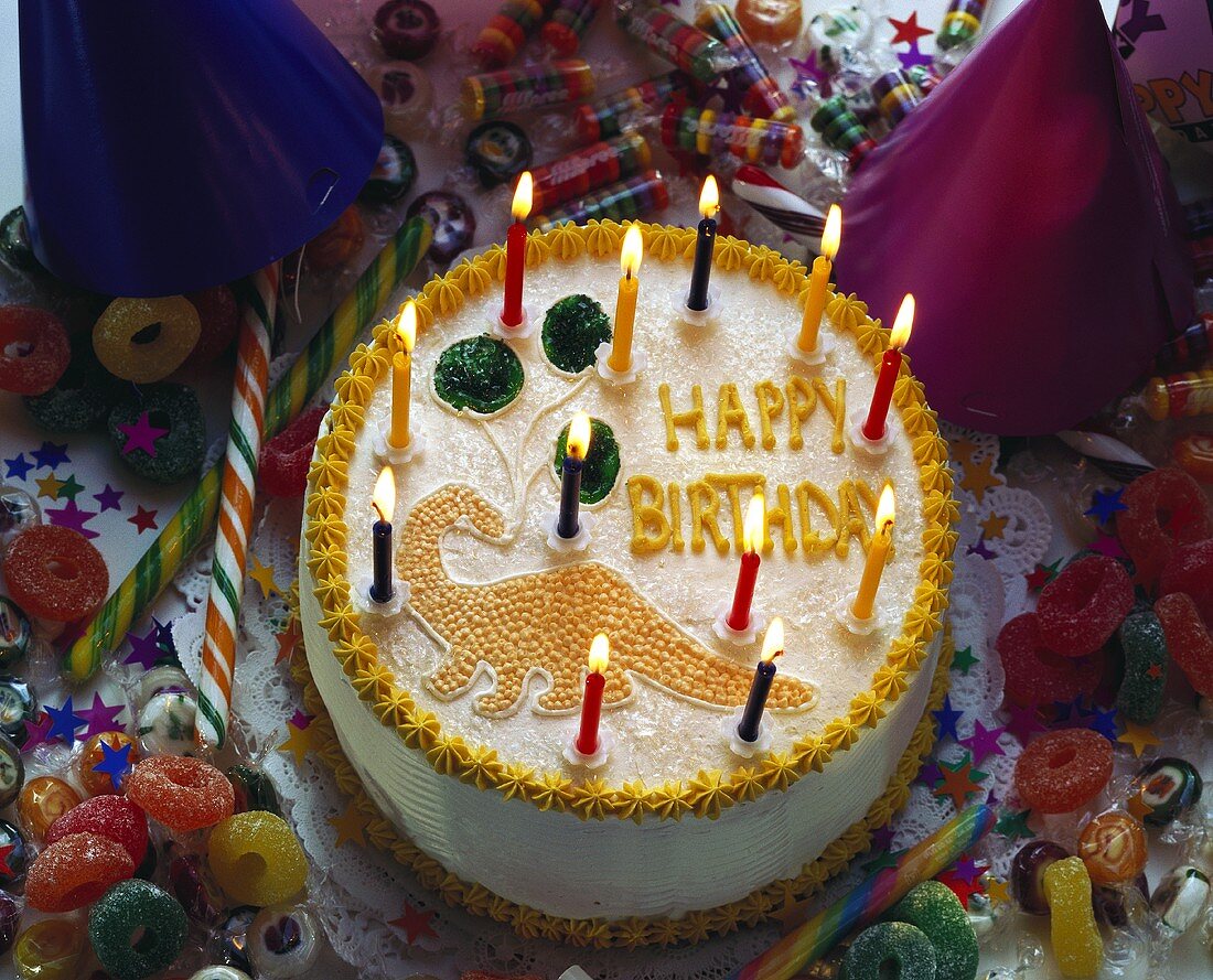 A cake with burning candles for a child's birthday