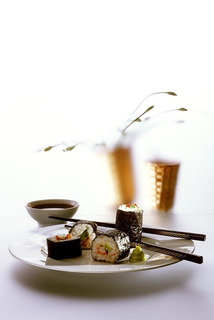 Sushi on a Plate with Chopsticks