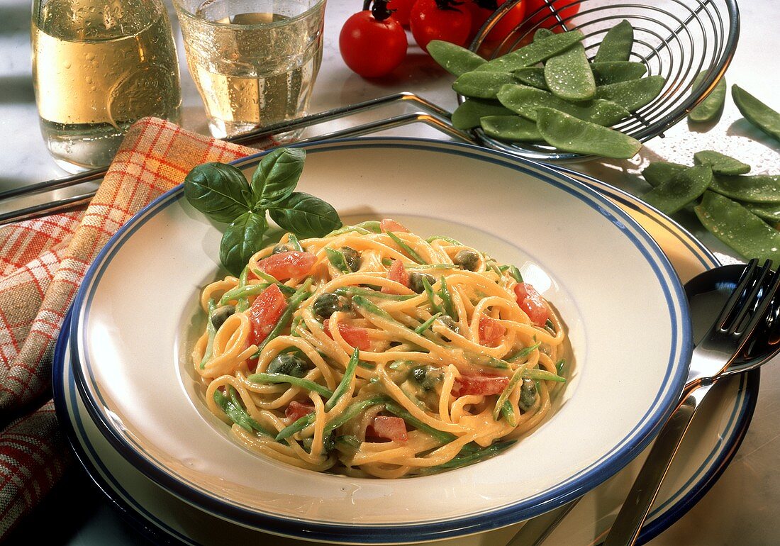 Spaghetti with emperor pod and caper sauce