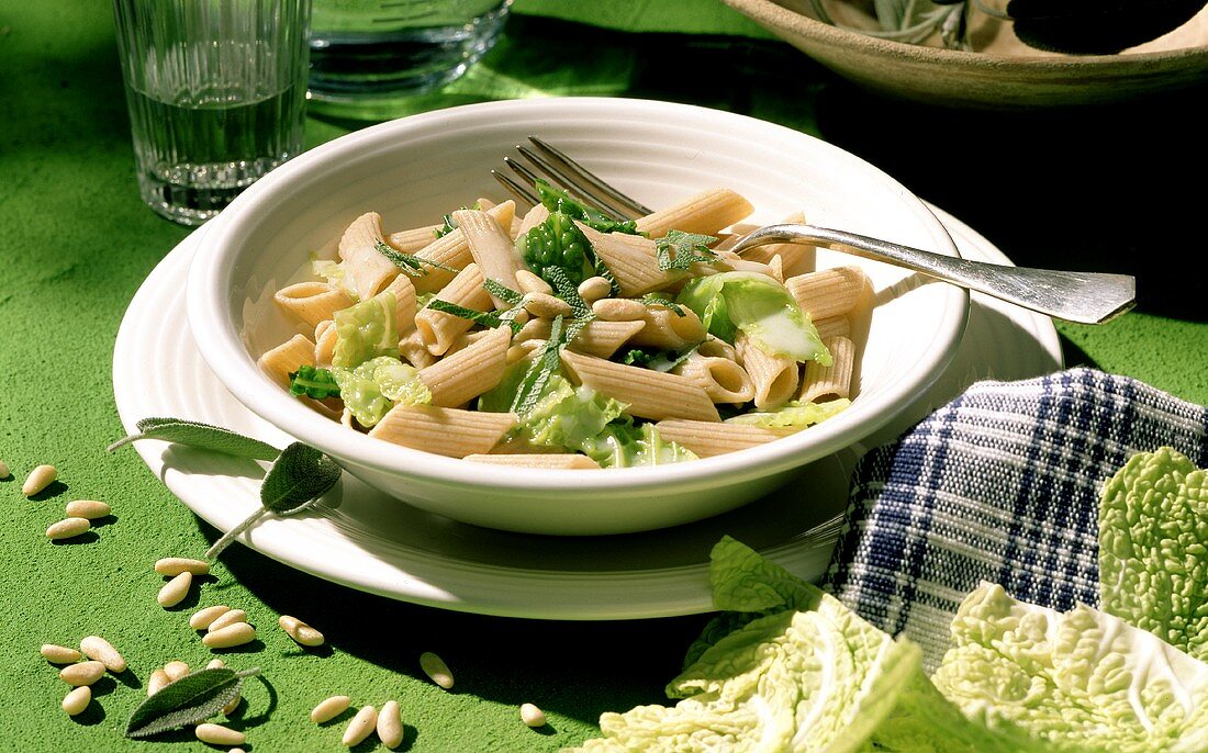 Wholemeal rigatoni with creamed savoy and pine nuts