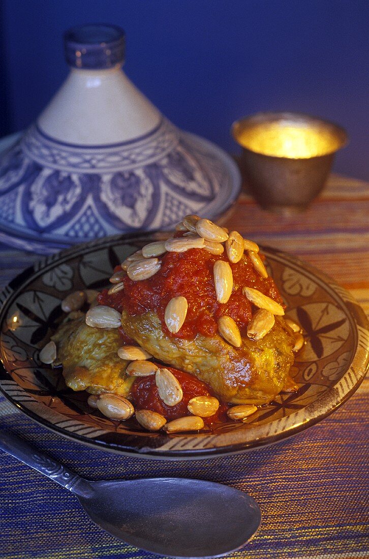 Chicken tajine with almonds and tomato sauce