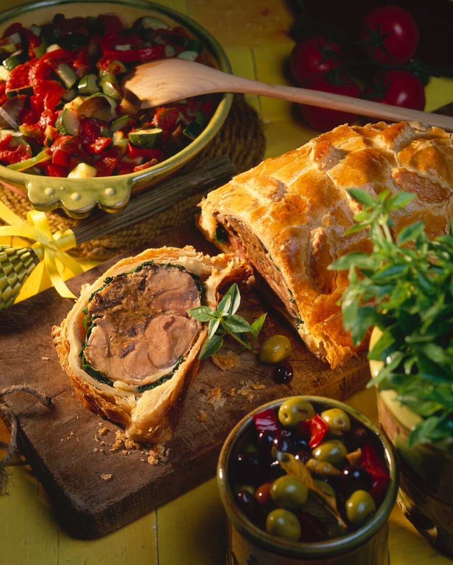 Lamb in puff pastry, piece cut, and vegetables