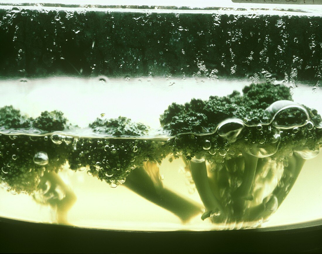 Broccoli florets in boiling water