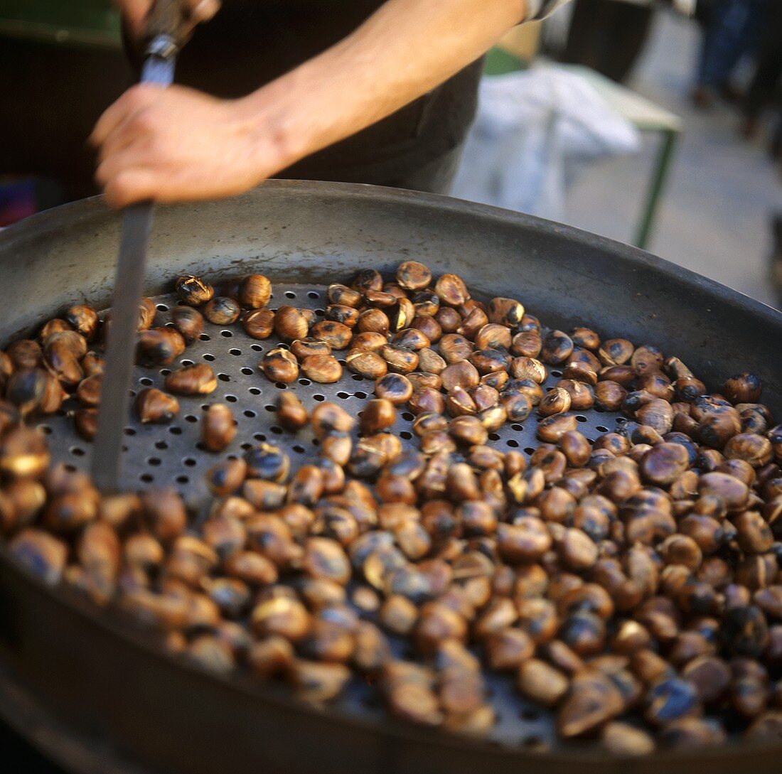 Sweet chestnuts being roasted