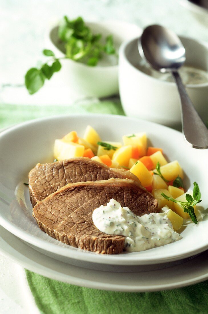 Boiled beef fillet with root vegetables & watercress dip