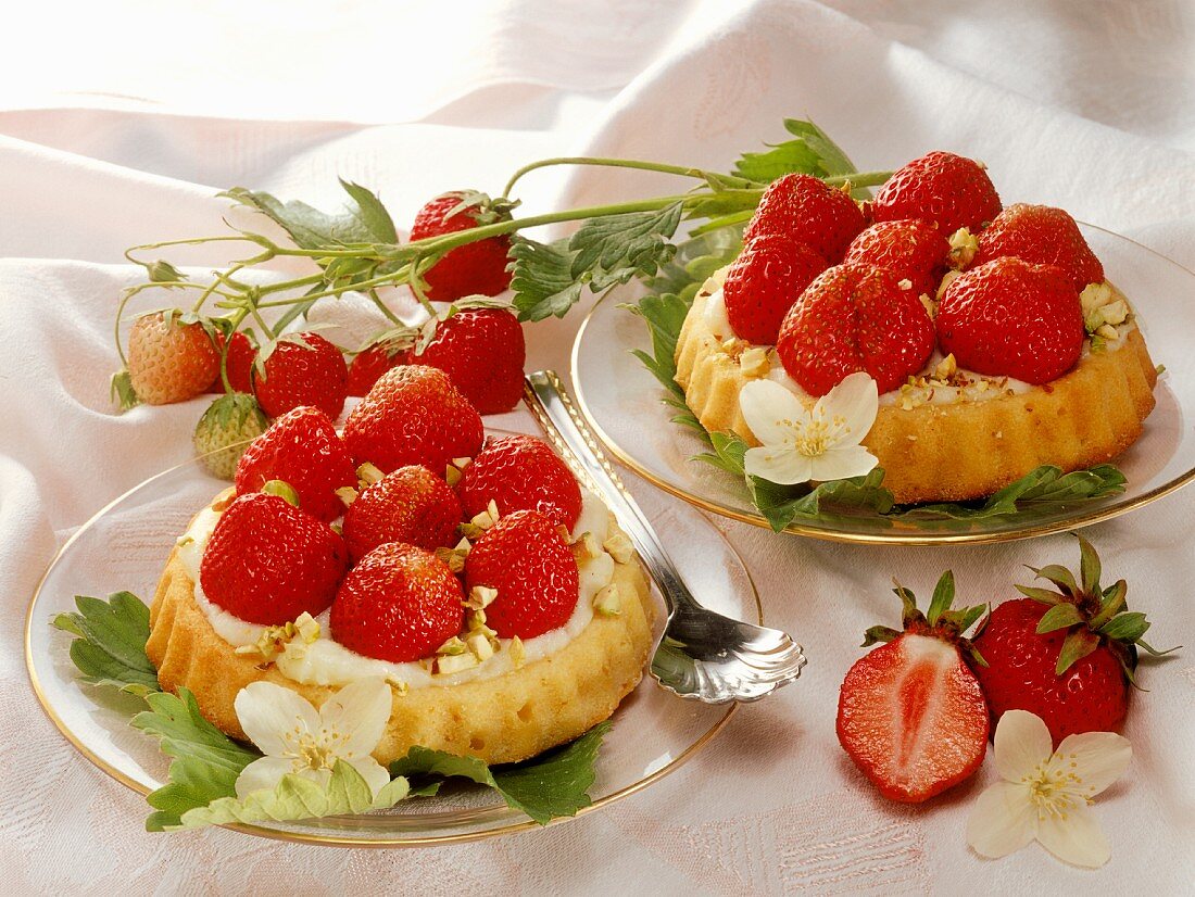 Two strawberry tartlets