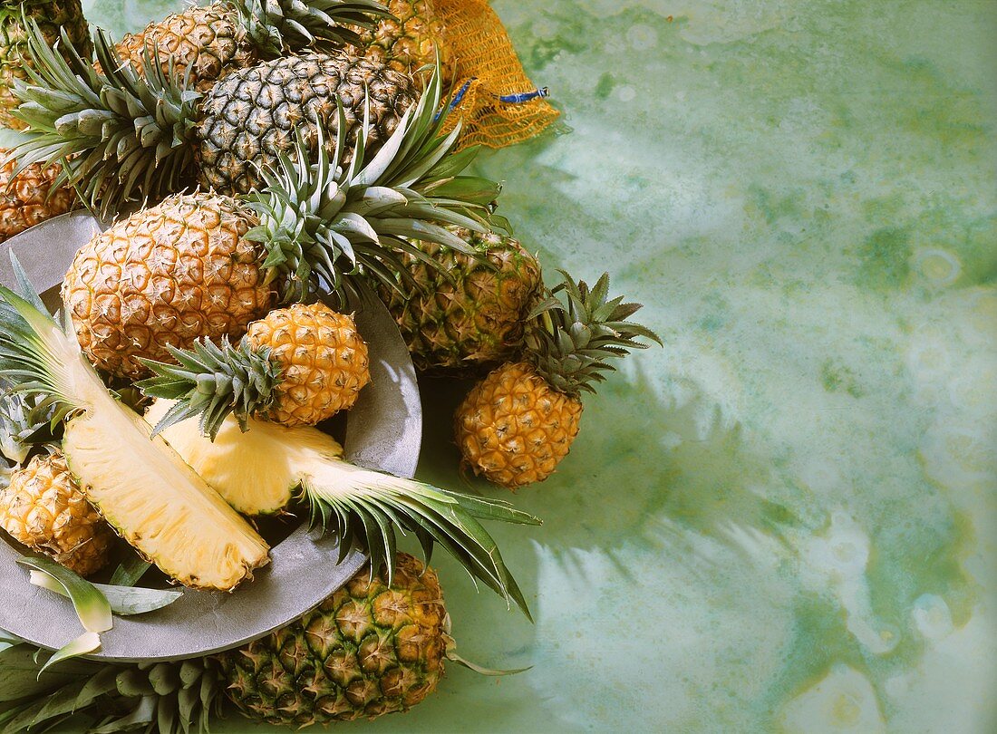 A few pineapples and two pineapple quarters
