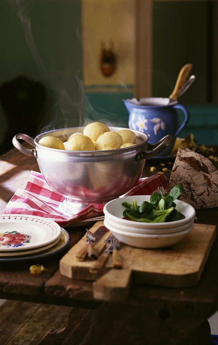 Steaming yeast dumpling on rustic table