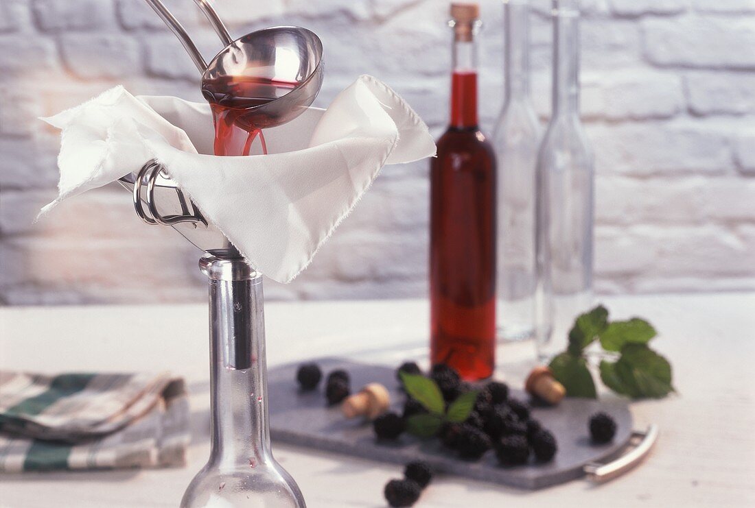 Making home-made blackberry liqueur